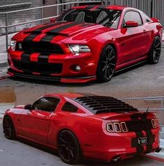 the red and black mustang is parked in front of a building with its hood up