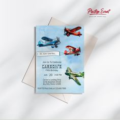 an old fashioned birthday card with airplanes flying in the sky and on top of it