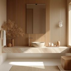 a white sink sitting under a mirror in a bathroom next to a wooden counter top