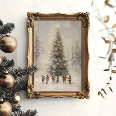 a painting hanging on the wall next to a christmas tree