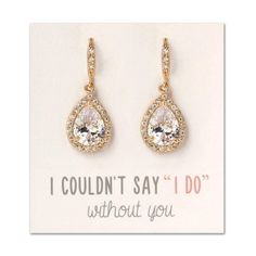 PRICES MAY VARY. 14K Yellow Gold finish, Cubic Zirconia with surrounding CZ crystals Fish Hook Earrings H 1.2 in (3 cm) x W 0.5 in (1.3 cm) Hypoallergenic, lead & nickel free Included: "I couldn't say 'I Do'…" card, gift box (L 3 in x W 2.25 in). Perfect for gift giving! Great for special occasions: wedding/bridal party jewelry gift, bridal shower, bachelorette, bridesmaids gift, sister The perfect gift to give to your bridesmaids on your special day! This Cubic Zirconia jewelry is medium weight Bridesmaid Gifts From Bride, Gold Bridesmaid Jewelry, Wedding Bridesmaid Jewelry, Wedding Day Gifts, Gift Sister, Bridesmaid Jewelry Sets