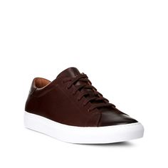 The streamlined silhouette of the Jermain sneaker is realized in pigment-dyed leather and finished with a lightweight rubber outsole. It is debossed at the tongue with Ralph Lauren’s signature Pony and at the heel with “Polo.” Casual Custom Sneakers With Perforated Toe Box, Sporty Custom Sneakers With Plain Toe And White Sole, Calf Leather Sneakers With Perforated Toe Box, Sporty Custom Sneakers With Vulcanized Sole, Sporty Custom Leather Sneakers With Plain Toe, Calf Leather Sneakers With Contrast Sole, Casual Low-top Custom Sneakers In Calf Leather, Streetwear Sneakers With Leather Sole And Plain Toe, Sporty Custom Leather Sneakers With Rubber Sole