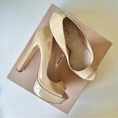 Authentic Miu Miu Heels. Worn Indoors Once, Then Stored! Still In Excellent Condition. Comes With Everything Pictured (Box, Ribbon, Card, Dust Bags). Color Is A Nude, With A Slight Pink Hue. Tough To Show The Color In Photos! Just Under 6" Heel Height, With 1.5" Platform (Making These 4.5" Pumps) Size 39, Which Is A Size 9, But These Fit More Like An 8.5 Please Carefully Examine All Photos For Flaws! Only Flaws On The Heels Are Some Discoloration In The Heels Of The Patent Leather. Some Sticker Miu Miu Heels, Platform Pumps Heels, Box Ribbon, Miu Miu Shoes, Platform Pumps, Pumps Heels, Miu Miu, Shoes Women Heels, Patent Leather