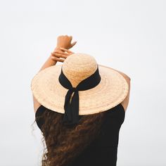 This Unique Beach Palm leaf hat is handmade by our artisan Magdaleno in Acapulco México. Details: Material: Palm Leaf Wide Brim fabric black bow Size M (56-58) all items are shipped from the USA. All Mi Mundo Mexicano items are 100% handmade by artisans in Mexico. Each stitch and item is completely unique and one-of-a-kind, so you'll never find two that are exactly the same! All handmade items may vary slightly in size, color, and design - that's what makes handmade items so special and charming Handwoven Hats For Vacation And Kentucky Derby, Handmade Black Straw Hat For Beach, Handwoven Hats For Kentucky Derby Vacation, Handmade Sun Hat For Kentucky Derby Vacation, Handmade Black Beach Hat, Summer Black Handwoven Sun Hat, Summer Black Handwoven Hats, Black Handwoven Sun Hat For Vacation, Handwoven Black Hat For Vacation