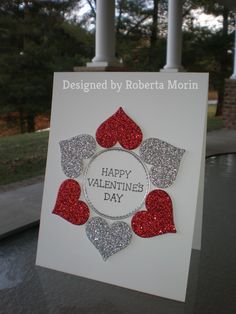 a valentine's day card with glitter hearts