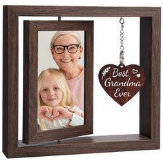 PRICES MAY VARY. Gifts for Grandma: Our picture frame is the perfect gifts for Grandma, Nana from granddaughter and grandson. A lovely keepsake that record the happiness between grandkids and grandparent. Great for Grandma Christmas Gifts, Thanksgiving Gifts, Mothers Day Gifts, Birthday Gifts, etc. Creative Design: This gift for grandmother and grandfather features a 360° rotating picture frame and a heart-shaped wood sign hanging beside. It allows you to display 2 photos simultaneously. Creativ Creative Birthday Gifts Fir Grandma, Creative Birthday Gifts For Grandma, Chridtmas Gifts For Grandparents, Grandm Gifts, Christmas Gift For My Grandma, Christmas Gifts For Granparents, Anniversary Picture Frame, Touching Words, Gifts For Grandma