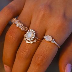 The Isla ring is even more stunning and flashy in real life! Set in rose gold, a natural rainbow moonstone is flanked by simulated diamonds for the most beautiful rosy effect. It's dainty, but still makes quite the statement! **This piece has natural gemstones with natural inclusions. We hand pick all stones for each ring, therefore every ring is different. We cannot guarantee the images online will perfectly reflect the stones you will receive, however each one is beautifully unique!** Product Rose Gold Black Diamond, Black Diamond Ring, Rainbow Moonstone Ring, Natural Stone Jewelry, Rings Cool, Moonstone Ring, Moon Stone, The Rose, Rainbow Moonstone