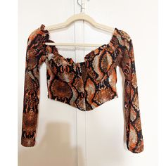 Available Size Medium And Large- Has A Lot Of Stretch Fitted Orange Top For Fall, Orange Tops For Fall Party, Orange Top For Fall Party, Fitted Orange Blouse For Fall, Fitted Orange Top For Night Out, Orange Party Top For Fall, Orange Fall Party Top, Trendy Orange Crop Top For Fall, Orange Tops For Night Out In Fall