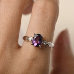 All HANDMADE ITEMS SHIP IN APPROX 8 DAYS Main Stone: Real natural amethyst Main Stone Size: Oval cut 6 mm x 8 mm Main Stone Weight: 1.19 carat Side Stone: CZ Height From The Ring Setting Bottom(to gemstone top): about 5.24 mm Width of Ring band Measure: gradually varied,about 2.14 to 2.99 mm Material: 925 Sterling Silver/14K White Gold/14K Yellow Gold/14k Rose Gold Engraved: Available For FreeNo more than 13 letters) Customized:Of course! Tell me what you want Includes With Order: All of my stor Purple Sapphire Ring With Diamond Birthstone, Purple Sapphire Birthstone Ring With Diamonds, Purple Sapphire Ring With Diamond, Dainty Amethyst Ring With Prong Setting, Purple Amethyst Diamond Ring, Birthstone, Purple Amethyst Diamond Ring Birthstone, Purple Amethyst Diamond Birthstone Ring, Purple Diamond Amethyst Birthstone Ring, Purple Amethyst Birthstone Ring With Diamond