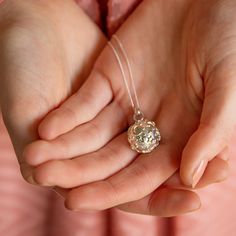 The stunning new starry night locket necklace. A most beautiful and innovative locket covered in the ninth sky, stars and the moon! It opens up to reveal a hanging disc which is hand stamped with your choice of up to three initials. Beautifully textured with polished smooth star embellishments and moon, this contemporary locket is available in all silver, or with rose or yellow gold plating. A truly gorgeous jewellery gift to give to a loved one to make a special occasion. Designed and made to b Flower Pendant Locket Necklace As Gift For Her, Flower Pendant Locket Necklace For Her, Celestial Locket Necklaces For Gifts, Celestial Locket Necklace For Gifts, Celestial Style Locket Jewelry Gift, Celestial Pendant Locket Jewelry, Celestial Pearl Pendant Jewelry As Gift, Elegant Silver Locket Necklace With Birthstone, Silver Delicate Locket Necklace Gift