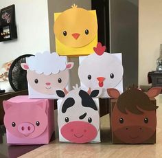 some paper bags with farm animals on them