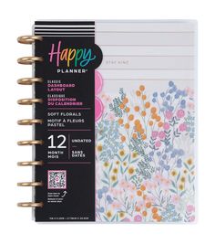 the happy planner book with flowers on it