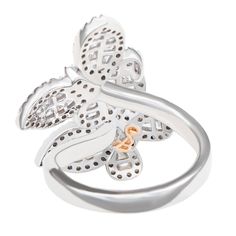 With elegance and subtlety, this Suzy Levian butterfly collection creation has become an icon of class, luxury and style. Let your creative side shine through with this whimsical double butterfly ring featuring white round and baguette shape cubic zirconia, hand set in sterling silver. This ring is designed by Suzy Levian with a message. By creating jewelry that is beautiful inside and out, Suzy Levian 's message is revealed through a hidden stone set inside the shank of this ring to empower wom Sl Logo, Double Butterfly, Butterfly Collection, Butterfly Ring, Beautiful Inside And Out, Creating Jewelry, Stone Settings, Two Tone, Cubic Zirconia