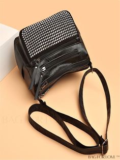 BagForLove - Zippered Studded Shoulder Bag: Decorative and Chic Product Description Color Black Type Square Bag Bag Size Small Pattern Type Plain Material PU Size Chart INCH CM Strap Length Bag Length Bag Width Bag Height Handle Height 47.2 inch 9.1 inch 5.1 inch 7.1 inch 2 inch Strap Length Bag Length Bag Width Bag Height Handle Height 120 cm 23 cm 13 cm 18 cm 5 cm Details Pictures Similar Products h2 { text-align: center; } /* æ¢è¡ */ li{ white-space: normal; word-break: break-all; word-wrap: break-word; } .red-box { width: 100%; display: flex; flex-direction: row; flex-wrap: wrap; justify-content: center; } .red-box > div { width: 190px; height: 250px; margin: 10px; } .red-box > div > a > img { width: 190px; height: 250px; } .size-box { width: 100%; margin: auto; white-space: nowrap; Faux Leather Shoulder Bag With Zipper For Party, Black Satchel With Zipper Closure For Party, Black Party Satchel With Zipper Closure, Black Shoulder Bag With Zipper Closure For Party, Black Faux Leather Shoulder Bag For Party, Bag Bag, Square Bag, Chic Decor, Bags Shoulder