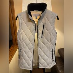 Calvin Klein Black And White Colored Vest. Zippers On Sides And One At The Top Left. Black Stretch Vest With Built-in Bra, Affordable V-neck Winter Vest, Calvin Klein Vest, Calvin Klein Sleevless Animal Print, Colorful Vest, Calvin Klein White, Vest White, Fall Coat, Calvin Klein Black