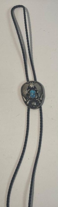 Vintage 1995 Metal Bolo Tie, Alpaca Silver and Blue Turquoise Stone, Shells Design, 2" x 1 1/2", Nice Design, Quality, Heavy Duty, Country & Western, Cowboy, Western Wear, Horse, Apparel, Accessory, Tie, Nice Quality Fashion, Free Shipping in the U.S. Southwestern Blue Bolo Tie For Gift, Southwestern Blue Bolo Ties As A Gift, Blue Handmade Bolo Tie Gift, Vintage Adjustable Turquoise Bolo Tie, Adjustable Vintage Turquoise Bolo Tie, Adjustable Blue Southwestern Bolo Tie, Adjustable Southwestern Blue Bolo Tie, Bohemian Blue Bolo Ties As Gift, Handmade Vintage Turquoise Bolo Ties