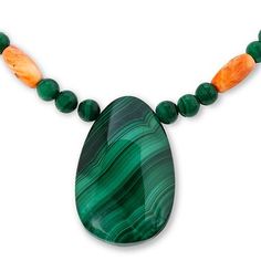 Jay King Malachite and Orange Spiny Oyster Shell Necklace Gorgeous green malachite is the star of this stylish necklace design from Jay King. The piece features a polished, pear-shaped drop of Congolese malachite front and center, with contrasting orange spiny oyster shell bead accents throughout.       Approx. 18-1/4"L x 1-3/4"W with 2-3/4" extender     Stamped .925     Hook closure     Green malachite necklace has large, pear-shaped malachite station in center     Oblong, orange/ white spiny o Malachite Pendant Necklace With Natural Stones, Green Natural Stone Teardrop Pendant Necklace, Green Oval Malachite Necklaces, Green Oval Malachite Necklace, Malachite Necklace, Green Malachite, Color Bands, Stylish Necklace, Necklace Design