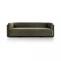 an olive green couch on a white background