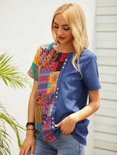 Blue Patchwork Short Sleeve Top, Blue Patchwork Crew Neck Top, Blue Casual Crew Neck Short Sleeve Top, Casual Patchwork Short Sleeve T-shirt, Relaxed Fit Patchwork Top With Crew Neck, Blue Relaxed Fit Short Sleeve Blouse, Blue Crew Neck Patchwork T-shirt, Casual Short Sleeve Patchwork T-shirt, Blue Blouse With Relaxed Fit And Short Sleeves