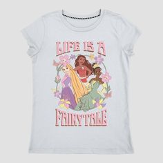 Cute and colorful, this Disney Princess 'Life is a Fairytale' Graphic T-Shirt will be your child's new go-to pick for everyday wear. The light blue pullover tee is elevated by the beautiful artwork of Disney princesses Moana, Tiana and Rapunzel within a floral wreath frame and the pink-lettered 3D-like text that reads "Life is a Fairytale." Made of midweight jersey fabric, this tagless T-shirt tailored with a loose fit that hits at the hip will help them stay comfortable during any activity. Tiana And Rapunzel, Cute Disney Shirts, Princess Life, Disney Princess Toddler, Princess Shirt, Wreath Frame, 24th Birthday, Minnie Mouse Girl, Pink Letter