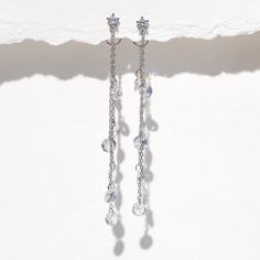 Dew you love these as much as we dew? With cascading droplets of CZ stones, these Dewdrop Earrings are stunners. Dainty Sparkling Drop Earrings, Dainty Nickel-free Drop Linear Earrings, Delicate Sterling Silver Drop Crystal Earrings, Dainty Rose Gold Crystal Drop Earrings, Rose Gold Metal Drop Crystal Earrings, Pink Dangle Earrings, Night Court, Necklace Chain Lengths, Earring Post