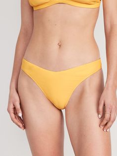 Elasticized low-rise V-front waistband.  High French-cut elasticized leg openings.  Includes hygienic sticker.  Quick-drying tricot, with full lining and comfortable stretch.  These bikini swim bottoms are made with 82% recycled polyester.  Less wast