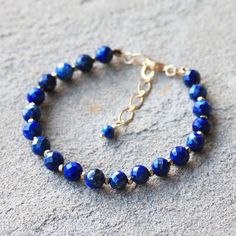 Natural Blue Lapis Lazuli Semi Precious Beaded Gemstone Gold Filled Bracelet Gold or Silver - Etsy Sapphire Lapis Lazuli Jewelry With Faceted Details, Blue Faceted Lapis Lazuli Jewelry, Faceted Blue Lapis Lazuli Jewelry, Gold Beaded Lapis Lazuli Bracelets, Sapphire Lapis Lazuli Beaded Bracelets, Sapphire Lapis Lazuli Bracelets With Round Beads, Gold Lapis Lazuli Bracelet With Gemstone, Sapphire Lapis Lazuli Gemstone Beaded Bracelets, Gold Lapis Lazuli Gemstone Bracelet