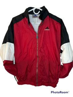 Vintage Adidas Red Zip Up Windbreaker Track Jacket Lightweight Hide A Way Hood. Please see measurements as this may be a wile a XL, or youth size. Does not look big enough to be me a XL Red Nylon Hooded Track Jacket, Red Nylon Hooded Jacket For Fall, Red Hooded Nylon Windbreaker, Sporty Red Windbreaker With Double-lined Hood, Red Nylon Track Jacket For Streetwear, Red Vintage Windbreaker For Winter, Vintage Red Track Jacket For Outdoor, Red Sport Coat For Winter Sports, Red Winter Sport Coat