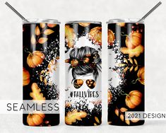 two stainless steel tumblers with pumpkins and leaves on them, one has the word fall vibes