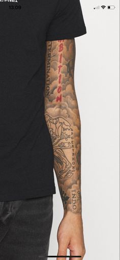 a man with a tattoo on his arm