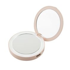 an empty compact mirror on a white background