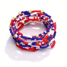 Make a statement with our elastic beaded stackable bracelets in patriotic red, white, and blue, some are accented with gold stars! Show off your style and patriotism with these versatile bracelets that can be easily stacked for a trendy look. Online orders will be given a random assortment. price is per bracelet.