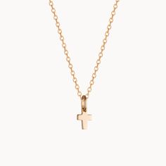 A timeless classic to treasure each day, our Mini Cross Charm Necklace is perfect for commemorating those special moments. Gift to a loved one or cherish your new favorite necklace in either 18K Champagne Gold Plated or 925 Sterling Silver.&nbsp;18K Champagne Gold Plated or 925 Sterling SilverMini Cross: 0.3 x 0.2Charms are removable from this chain and can be worn on all Merci Maman chain lengthsSent with love in a complimentary gift box Dainty Sterling Silver Necklace In Yellow Gold, Everyday Gold Plated Cross Pendant Necklace, 14k Gold Clavicle Chain Necklace With Cross Pendant, 14k Gold Clavicle Chain With Cross Pendant, Minimalist 14k Gold Cross Pendant Necklace, Everyday 14k Yellow Gold Cross Necklace, 14k Gold Cross Pendant Jewelry For Everyday, Classic Rose Gold Charm Necklace With Clavicle Chain, Yellow Gold Charm Necklace With Cross Pendant