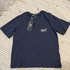 Vineyard Vines Size 5 American Flag Whale Vineyard Vines Sweatshirt, Navy Short Sleeve Tops With Pockets, Spring Navy Crew Neck Shirt, Navy Crew Neck Shirt For Spring, Blue T-shirt With Pockets And Short Sleeves, Navy Casual Tops With Pockets, Casual Navy Tops With Pockets, Blue Short Sleeve Tops With Pockets, Vinyard Vines