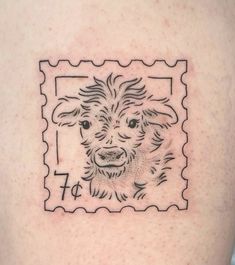 a stamp with a drawing of a dog on it's back shoulder and the word f is written in black ink