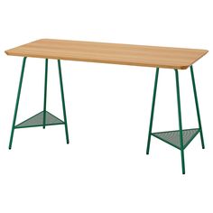 a wooden table with green metal legs