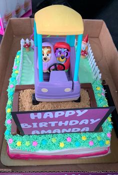 a birthday cake in the shape of a toy car