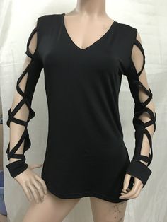 Deep v-neck can show your sexy clavicle,hollow out design can show your hot figure,irregular design make you looked much cooler,you can wear it at your daily life,get one you prefer and show yourself.Colors:Black, Gray, KhakiSize:S, M, L, XL, 2XLMaterial:VinylonSleeve Length:LongLength:LongCollar:V-neckPattern Type:SolidOccasion:DailyStyle:Sexy Summer V-neck Hollow Out Top, Chic Hollow Out Tops For Night Out, Edgy Hollow Out Top For Night Out, Edgy Hollow Out Tops For Party, Fitted Gothic V-neck Top, Hollow Out Top For Spring Night Out, Spring Hollow Out Tops For Night Out, Hollow Out Tops For Night Out In Spring, Fall Party Tops With Hollow Out Details