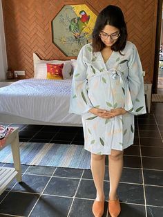 This is our maternity robe in our softest stretch jersey organic cotton. You can use it during pregnancy and later for nursing too. It will make an amazing gift for any mom to be.It works great for hospital gown as well. I can add buttons in the back for epidural. You can choose that option at the time of checkout.As for the fabric pattern, we have used a hand drawn and digitally painted technique. So they are all unique designs. And we got these designs printed on the softest Jersey knit stretc Cotton Nursing-friendly Sleepwear For Maternity, Cotton Nursing Friendly Sleepwear For Maternity, Cotton Maternity Sleepwear Nursing Friendly, Cotton Nursing Friendly Maternity Dress, Cotton Maternity Dress Nursing Friendly, Blue Cotton Maternity Dress, Bump Friendly Cotton Maternity Dress, Spring Cotton Maternity Dress, Cotton Long Sleeve Maternity Dress