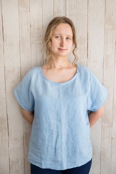 "This blouse is made from natural Lithuanian linen that meets OEKO-TEX® quality standards. Perfect choice for every women looking for a lightweight shirt. Top is so smooth and soft that You can forget that You wear a shirt! Linen is a versatile, practical and elegant material. You can combine these linen blouses with a variety of clothes (skirts, pants, jeans). Linen also fits with most clothing styles, You can wear blouses during the day and dress up for the evening. DETAILS: <> Made from Blue Linen Tops For Everyday, Blue Linen Crew Neck Top, Relaxed Fit Linen Tops In Flax Color, Relaxed Fit Linen Tops In Natural Color, Linen Blouses, Clothes Skirts, Linen Shirts Women, Shirt Linen, Linen Clothing