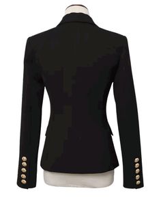 Tanya Black Double Breasted Blazer with Gold Buttons - SLIM FITFeatures: - Slim Fit Design - Single Gold Button Closure - Gold Button Cuffs - Peak Lapels - Two Faux Side Pockets - Shoulder Padding The Tanya Black Double Breasted Blazer is the ultimate must-have for any wardrobe: the perfect classic black blazer for women. This blazer is expertly crafted to perfection, with an exquisite blend of style and functionality that is sure to impress. The gold button detailing adds a touch of luxury and elegance, bringing a timeless appeal to this already classic piece. The double-breasted design is the epitome of sophistication and creates a figure-flattering silhouette that is both feminine and powerful. Our Tanya Black Double Breasted Blazer is designed for versatility, making it perfect for any Fitted Blazer With Gold Buttons For Work, Fitted Party Blazer With Button Cuffs, Fitted Blazer With Gold Buttons, Fitted Blazer With Gold Buttons, Button-up, Fitted Button-up Blazer With Gold Buttons, Black Office Blazer With Button Closure, Fitted Party Blazer With Gold Buttons, Fitted Button-up Blazer With Button Closure, Formal Fitted Blazer With Snap Buttons