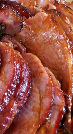 closeup of sliced bacon on a white plate