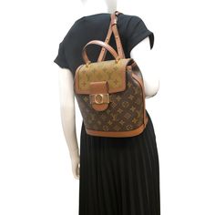 Item Details: The Louis Vuitton Dauphine PM Monogram Reverse is a true testament to timeless style. This handbag boasts the iconic LV monogram in a stunning reverse canvas, marrying heritage design with a contemporary twist. Elevate your ensemble with this classic piece that exudes luxury and sophistication. Model: Dauphine PM Style: Backpack Material: Monogram Reverse Canvas with Leather Trim Color: Brown Made: France Made Year: 2020 Date Code: SP0240 Measurements: W 8.5" D 6" H 9.5" Accessorie Louis Vuitton Dauphine, Leather Tanning, Pm Monogram, Reverse Canvas, Backpack Material, Lv Monogram, Balenciaga Designer, Canvas Backpack, Trim Color