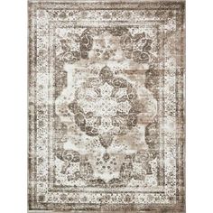 a large rug with an ornate design on the front and back side, in beige tones