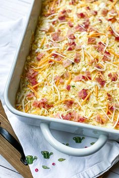 a casserole dish with ham and cheese on top is ready to be eaten