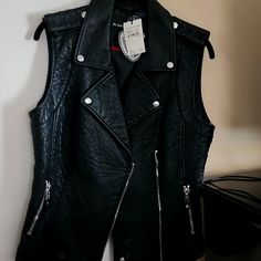 Leather Vest, Blanc Noir, Size Medium. Purchase From Nordstrom Rack. Never Worn. Edgy Black Vest For Fall, Black Winter Vest For Night Out, Edgy Black Vest For Workwear, Casual Black Vest For Night Out, Edgy Black Vest For Work, Spring Biker Vest In Black, Spring Black Biker Vest, Black Vest For Night Out In Fall, Trendy Black Vest For Night Out