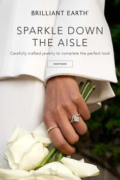 a woman holding a bouquet of flowers with the words sparkle down the aisle on it