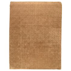 a brown rug on a white background with no one in the room to see it