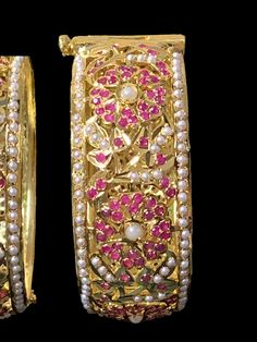 Indulge in the luxurious beauty of the Alea jadau bangles in rubies from Deccan Jewelry. These imitation designer bangles are a true work of art,with intricate detailing and delicate design that exudes a sense of timeless elegance and sophistication. Features Ready-to-ship bangles Adjustable screw Each bangle is 22ct gold coated, adding to their opulent feel and ensuring they will remain in your collection for years to come. The adjustable screw mechanism ensures a perfect fit, making them suita Traditional Ruby Bangle For Festive Occasions, Traditional Gold Bangle With Ruby, Traditional Gold Ruby Bangle, Traditional Ruby Bracelets For Festive Occasions, Traditional Ruby Bracelet For Festive Occasions, Festive Ruby Bangle In Temple Jewelry Style, Traditional Ruby Bangle With Stone Work, Festive Gold Bangle With Ruby, Festive Gold Ruby Bangle