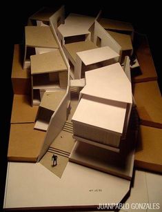 an architectural model of a building made out of cardboard